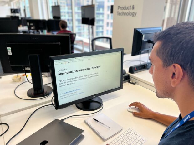 man at the computer reading the Algorithmic Transparency Standard on GOV.UK